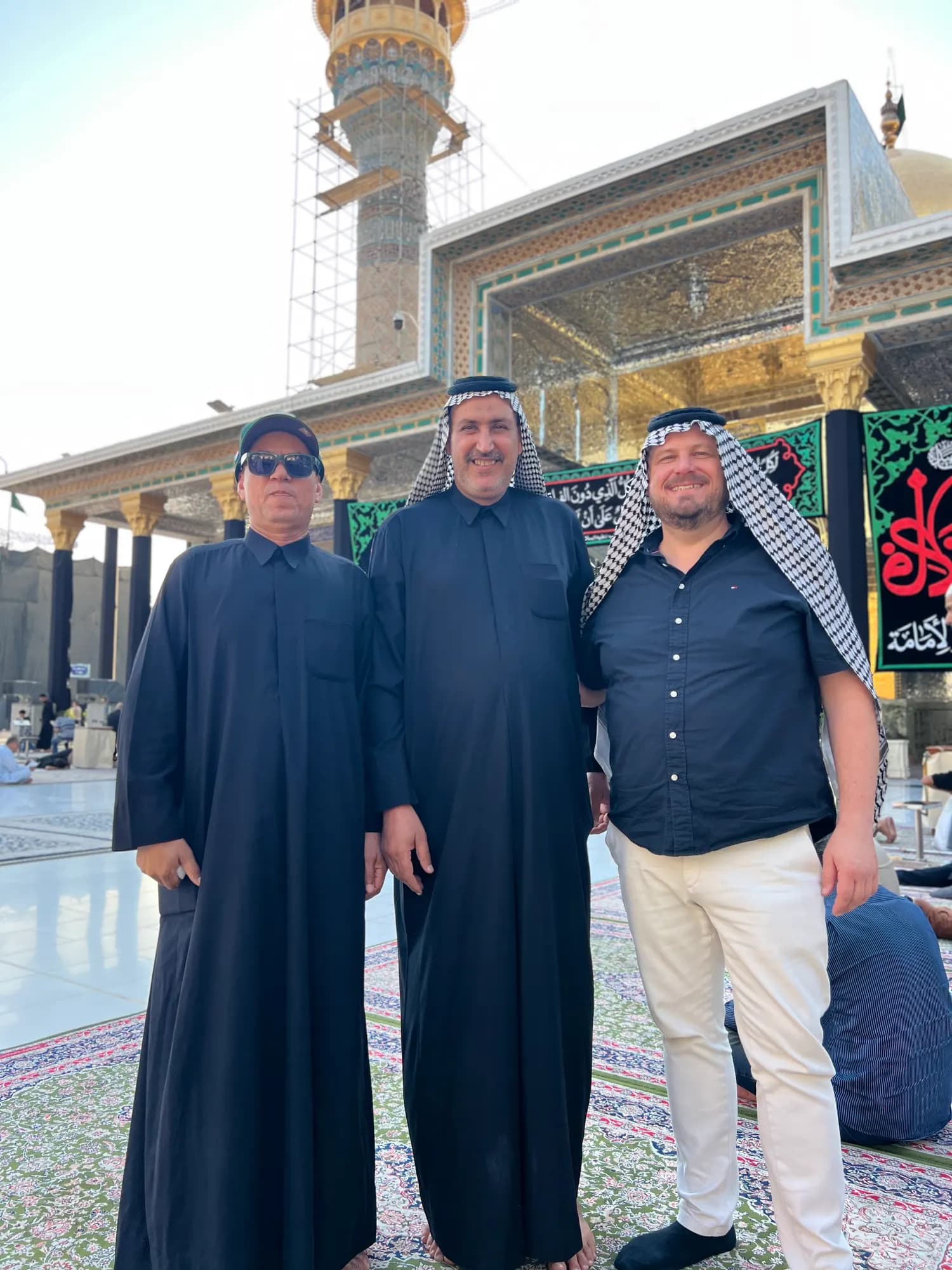 Lars from the Netherlands enjoys time with his Sumerian friends during a visit to a Shia shrine in Baghdad.