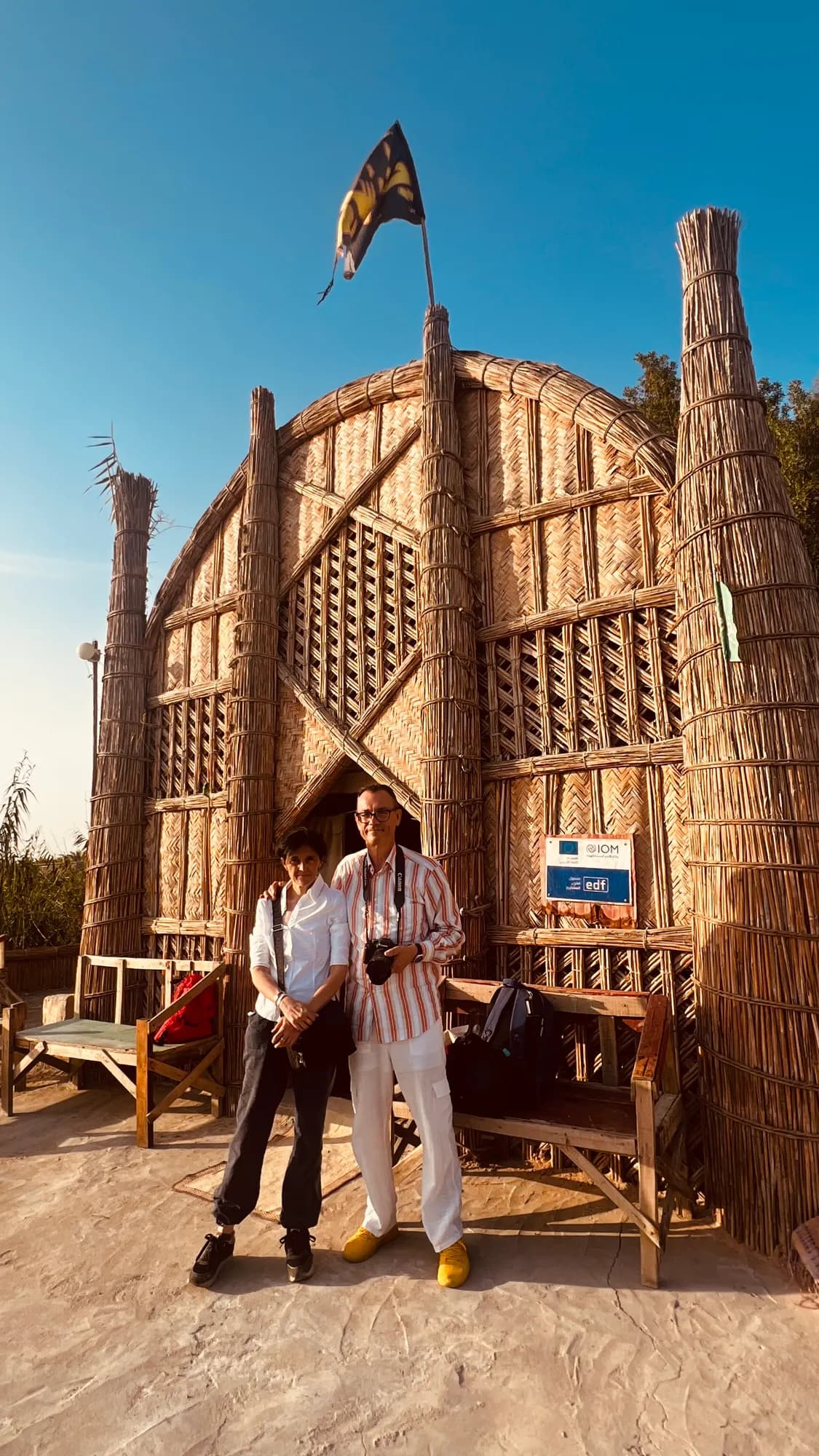 Cristina and Paolo from Italy in front of the Sumerian reed house